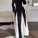 Elegancka czarno-biała sukienka maxi z okrągłym dekoltem i długim rękawem